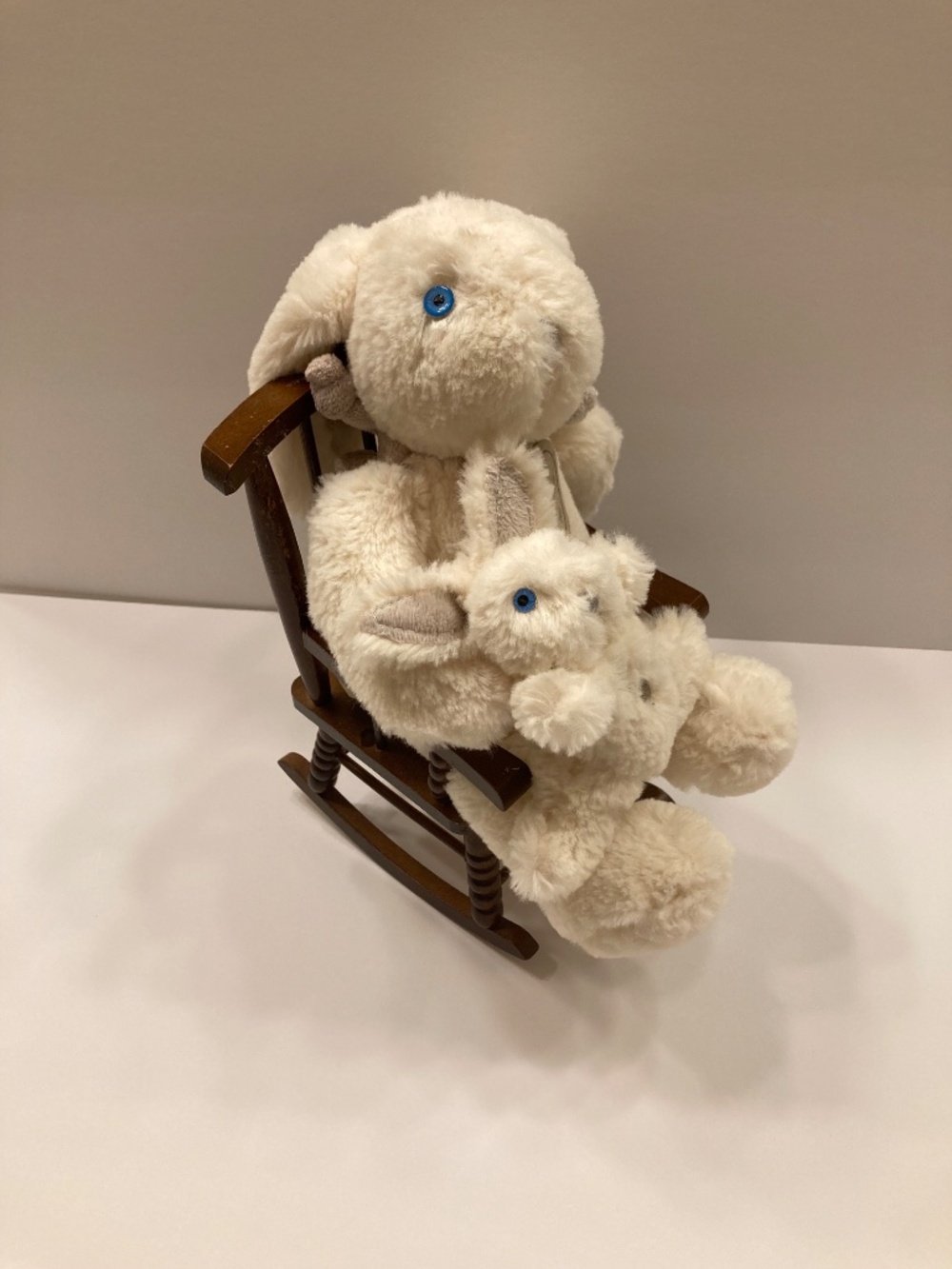 Bunny and musical baby in a rocker